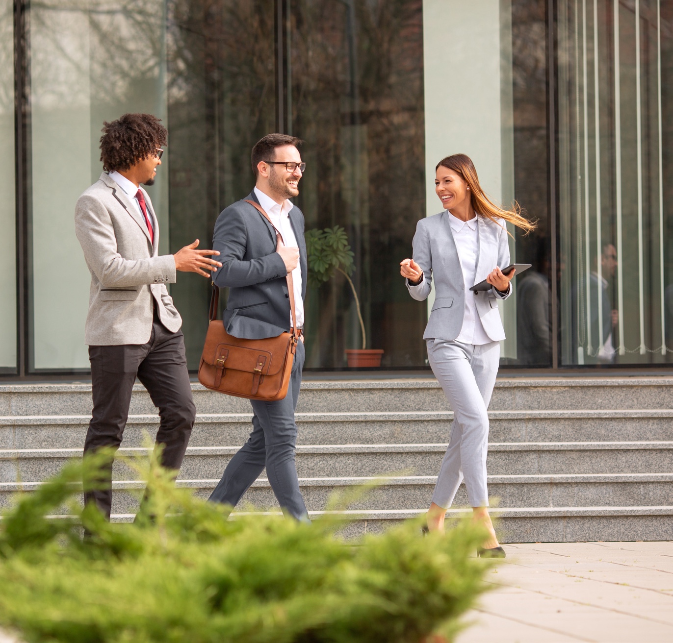 Executives walking in to the office
