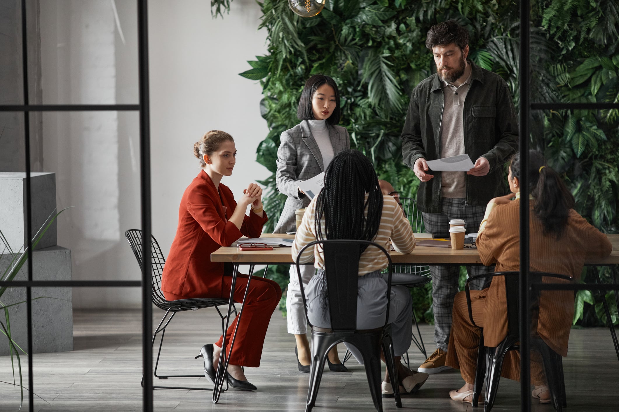 Modern Professionals holding meeting